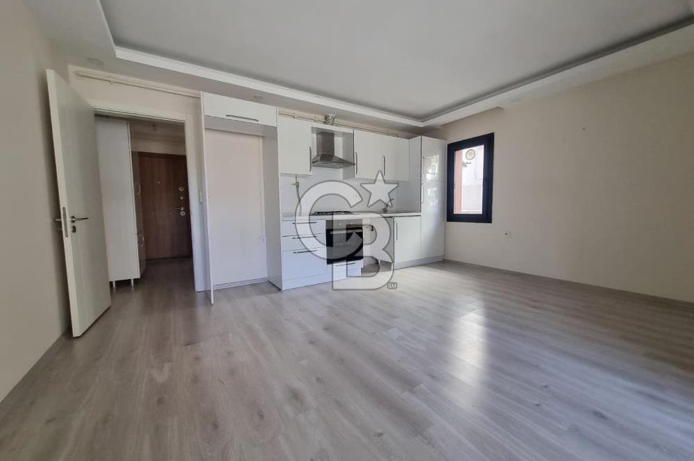 Menteşe Orhaniye Mahallesi’nde Kapalı Balkonlu 1+1 Kiralık Daire – Şehir Merkezinde!”