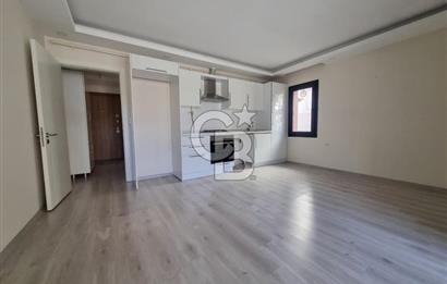 Menteşe Orhaniye Mahallesi’nde Kapalı Balkonlu 1+1 Kiralık Daire – Şehir Merkezinde!”