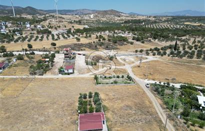 DİKİLİ ÇANDARLI’DA ANAYOLA KOMŞU SATILIK YATIRIMLIK ARSA