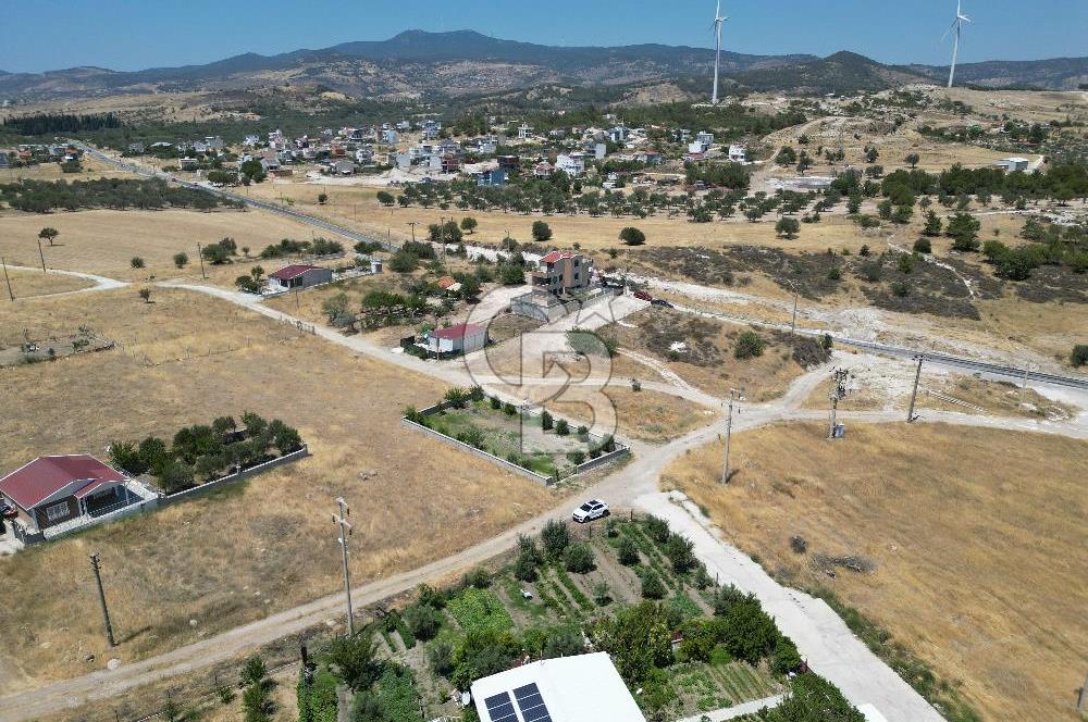 DİKİLİ ÇANDARLI’DA ANAYOLA KOMŞU SATILIK YATIRIMLIK ARSA