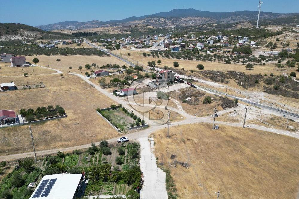 DİKİLİ ÇANDARLI’DA ANAYOLA KOMŞU SATILIK YATIRIMLIK ARSA