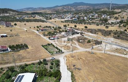 DİKİLİ ÇANDARLI’DA ANAYOLA KOMŞU SATILIK YATIRIMLIK ARSA