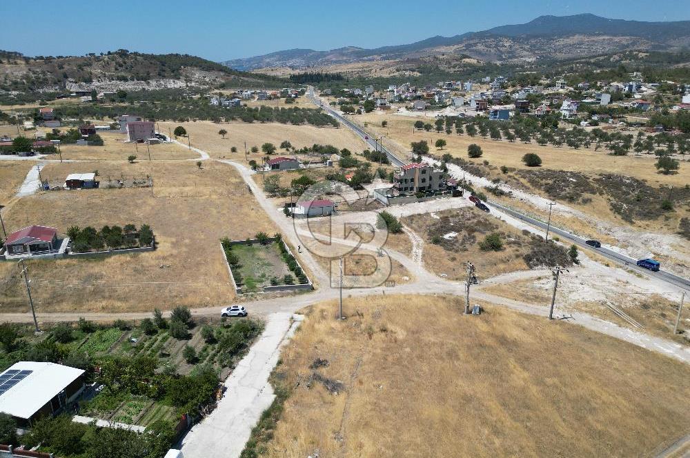 DİKİLİ ÇANDARLI’DA ANAYOLA KOMŞU SATILIK YATIRIMLIK ARSA