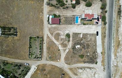 DİKİLİ ÇANDARLI’DA ANAYOLA KOMŞU SATILIK YATIRIMLIK ARSA