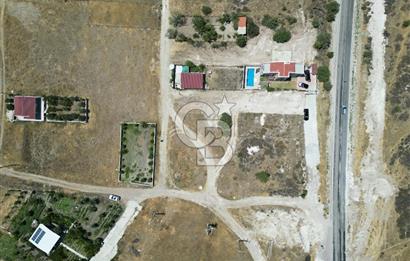DİKİLİ ÇANDARLI’DA ANAYOLA KOMŞU SATILIK YATIRIMLIK ARSA