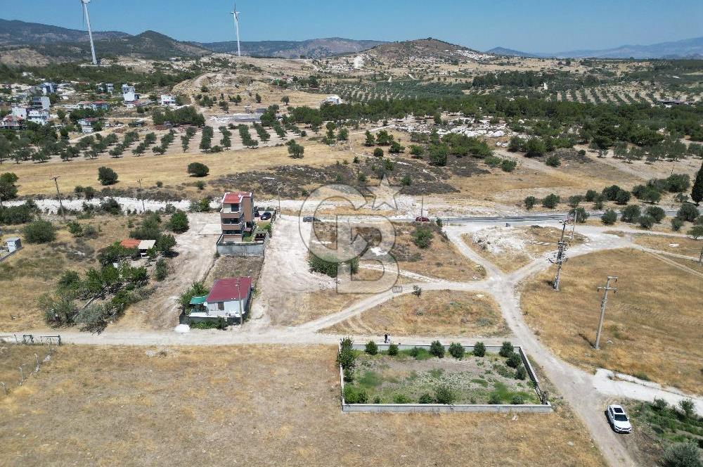 DİKİLİ ÇANDARLI’DA ANAYOLA KOMŞU SATILIK YATIRIMLIK ARSA