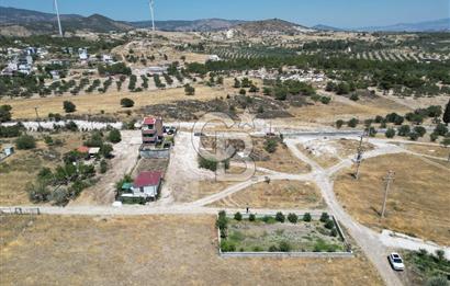 DİKİLİ ÇANDARLI’DA ANAYOLA KOMŞU SATILIK YATIRIMLIK ARSA