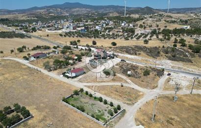 DİKİLİ ÇANDARLI’DA ANAYOLA KOMŞU SATILIK YATIRIMLIK ARSA