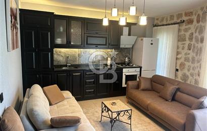 CB Giz'den Kalkan Kalamarda 1+1 ortak havuzlu site icinde daire