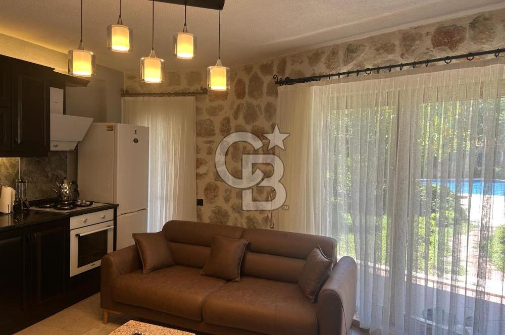 CB Giz'den Kalkan Kalamarda 1+1 ortak havuzlu site icinde daire