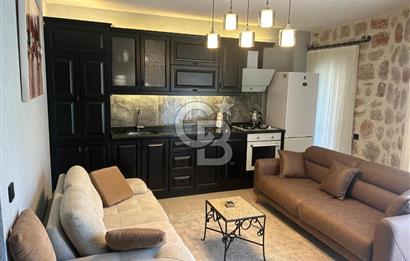 CB Giz'den Kalkan Kalamarda 1+1 ortak havuzlu site icinde daire