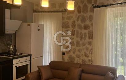 CB Giz'den Kalkan Kalamarda 1+1 ortak havuzlu site icinde daire