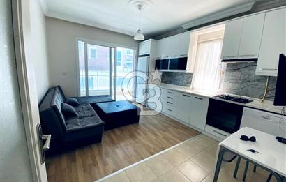 İZMİR BAYRAKLI OSMANGAZİ GÜNEŞKENT SİTESİ'NDE SATILIK 1+1 DAİRE