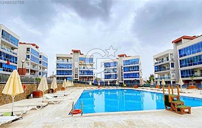 İZMİR BAYRAKLI OSMANGAZİ GÜNEŞKENT SİTESİ'NDE SATILIK 1+1 DAİRE