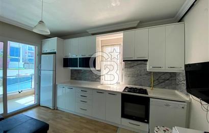 İZMİR BAYRAKLI OSMANGAZİ GÜNEŞKENT SİTESİ'NDE SATILIK 1+1 DAİRE