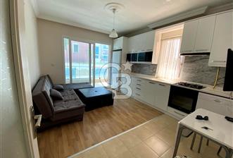 İZMİR BAYRAKLI OSMANGAZİ GÜNEŞKENT SİTESİ'NDE SATILIK 1+1 DAİRE