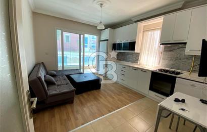 İZMİR BAYRAKLI OSMANGAZİ GÜNEŞKENT SİTESİ'NDE SATILIK 1+1 DAİRE