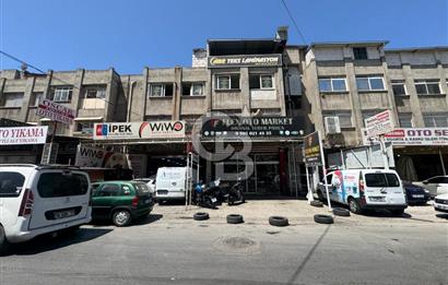 Karabağlar Sanayi de İşlek cadde üzeri Ruhsatlı Satılık Dükkan