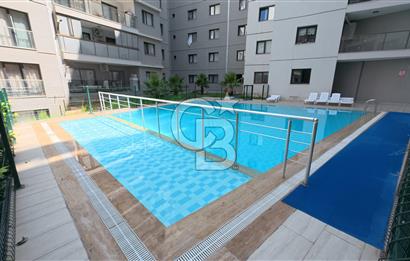 EGE İNCİ EVLERİ'NDE SATILIK 3+1 GENİŞ FERAH DAİRE