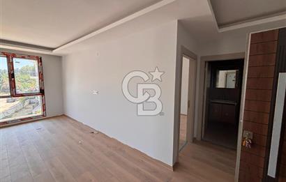 Ayvalık Sarımsaklı'da 1+1 Sıfır Plaja 50m Daire