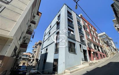 KONAK ZAFER TEPE MAH ARA KAT ÇİFT CEPHE GENİŞ ve FERAH 1+1 SATILIK DAİRE