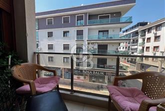 KARŞIYAKA ÖRNEKKÖY DE KÖŞE BİNA CADDEÜSTÜ KAPALI MUTFAK SATILIK DAİRE 