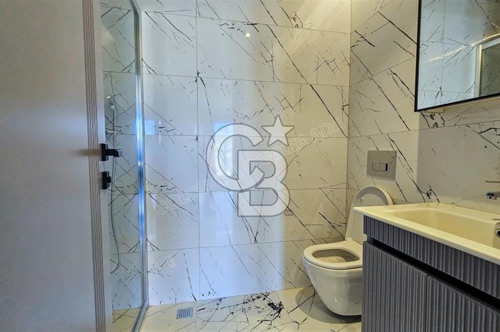 KUŞADASI MERKEZDE K.OTOPARKLI GÜVENLİKLİ HAUZLU YENİ 2+1 DAİRE 