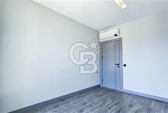 KUŞADASI MERKEZDE K.OTOPARKLI GÜVENLİKLİ HAUZLU YENİ 2+1 DAİRE 