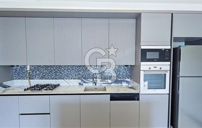 KUŞADASI MERKEZDE K.OTOPARKLI GÜVENLİKLİ HAUZLU YENİ 2+1 DAİRE 
