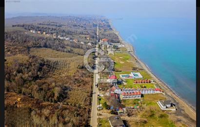 Otele %50, Konuta %15 İmarlı - Yola 30m Cephe, Deniz Manzaralı