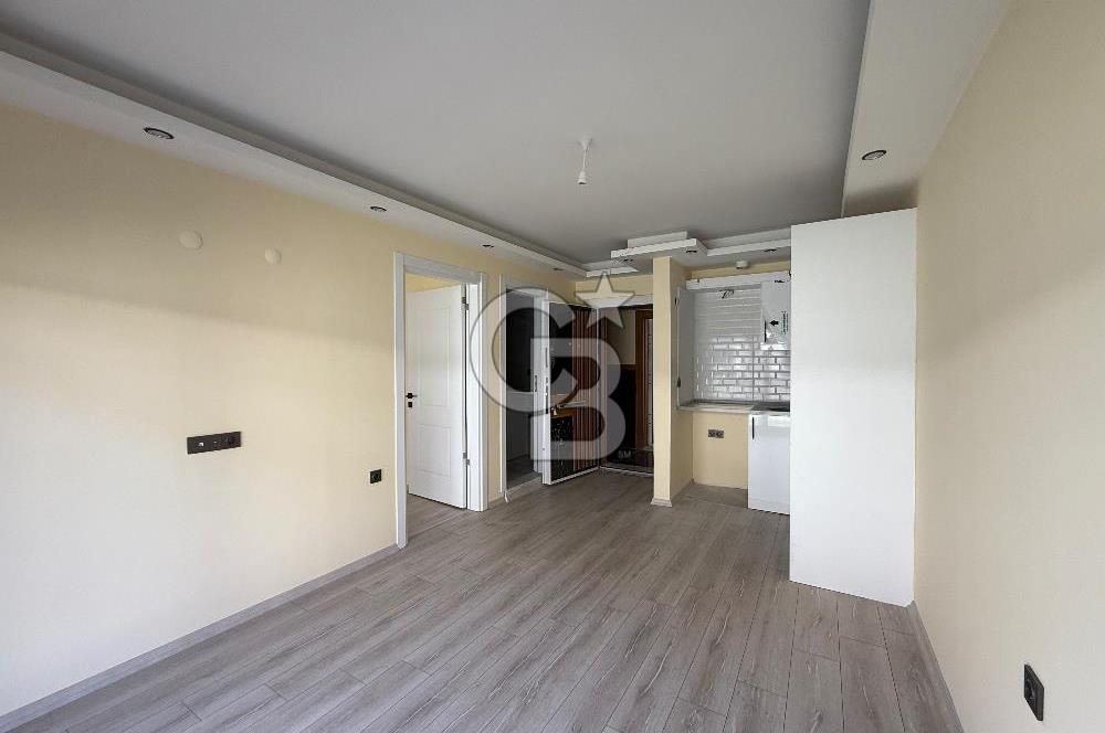 ÇANDARLI MERKEZDE  SİTE İÇİNDE SIFIR 1+1  SATILIK DAİRE