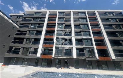Küçükçiğli Atlas Life Sitesinde 1+1 Satılık Havuz Cephe Daire