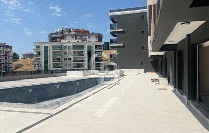 Küçükçiğli Atlas Life Sitesinde 1+1 Satılık Havuz Cephe Daire