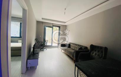 BUCA MENDERES HALK CADDESİNDE EŞYALI SATILIK 1+1  DAİRE