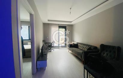 BUCA MENDERES HALK CADDESİNDE EŞYALI SATILIK 1+1  DAİRE
