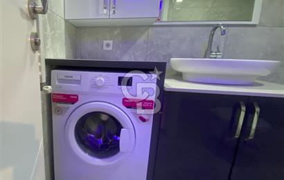 BUCA MENDERES HALK CADDESİNDE EŞYALI SATILIK 1+1  DAİRE