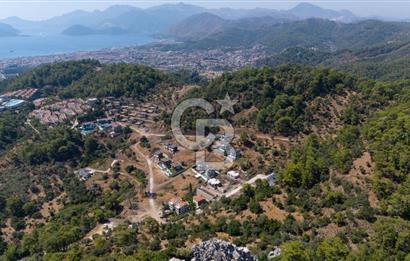 CB MARİNA'DAN MARMARİS BELDİBİNDE SATILIK İMARLI 864 M2 ARSA