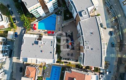 KUŞADASI PANORAMİK DENİZ MANZARALI SİTEDE ÇATI KATI 3+1 DAİRE