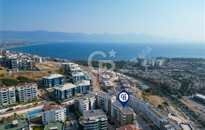 KUŞADASI PANORAMİK DENİZ MANZARALI SİTEDE ÇATI KATI 3+1 DAİRE