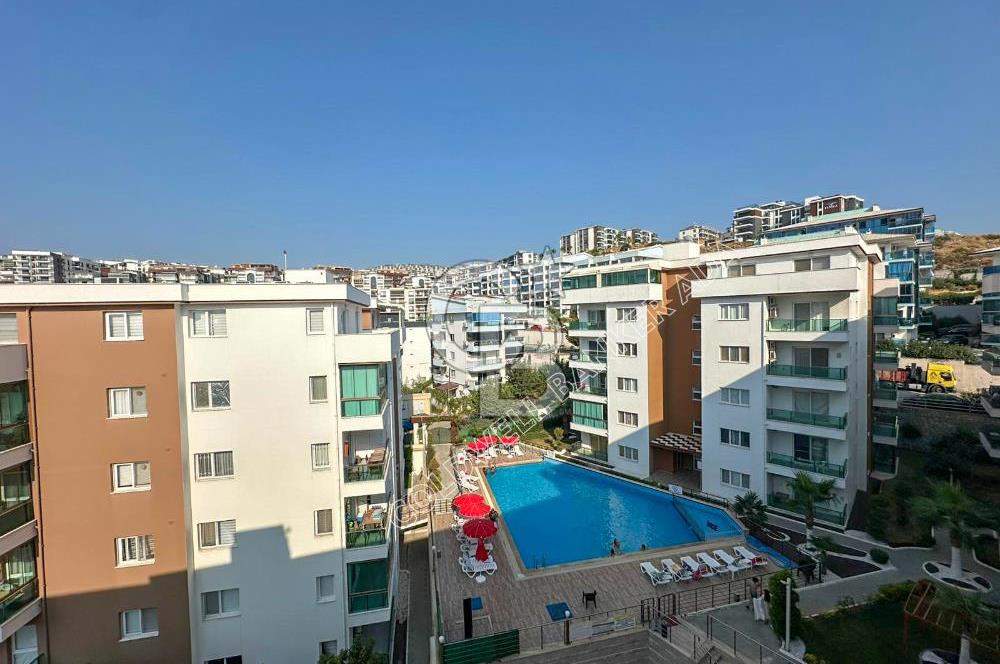 KUŞADASI PANORAMİK DENİZ MANZARALI SİTEDE ÇATI KATI 3+1 DAİRE