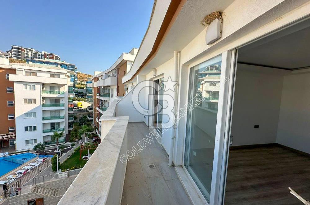 KUŞADASI PANORAMİK DENİZ MANZARALI SİTEDE ÇATI KATI 3+1 DAİRE