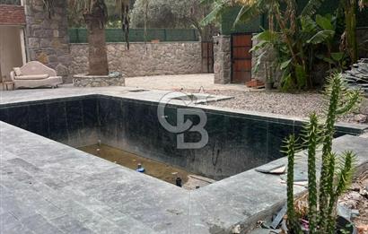 BODRUM GÖLKÖY'DE yıllık kiralık ÖZEL HAVUZLU VE PLAJLI TAŞ VİLLA