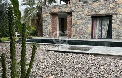 BODRUM GÖLKÖY'DE yıllık kiralık ÖZEL HAVUZLU VE PLAJLI TAŞ VİLLA