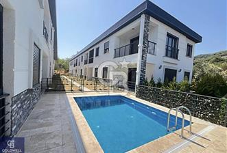 GÜRE ÇAMLIBELDE BAHÇE KULLANIMLI HAVUZLU SATILIK 1+1 DAİRE