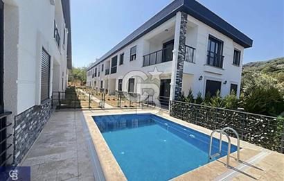 GÜRE ÇAMLIBELDE BAHÇE KULLANIMLI HAVUZLU SATILIK 1+1 DAİRE