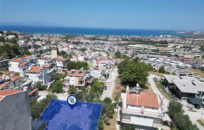 KUŞADASI MERKEZDE DENİZ MANZARALI SATILIK VİLLA İMARLI ARSA