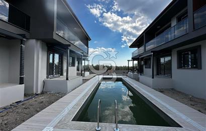 COLDWELL BANKER İYA GAYRİMENKUL’DEN  ÇANDARLI MERKEZDE SİTE İÇERİSİNDE 1+1 KİRALIK DAİRE 
