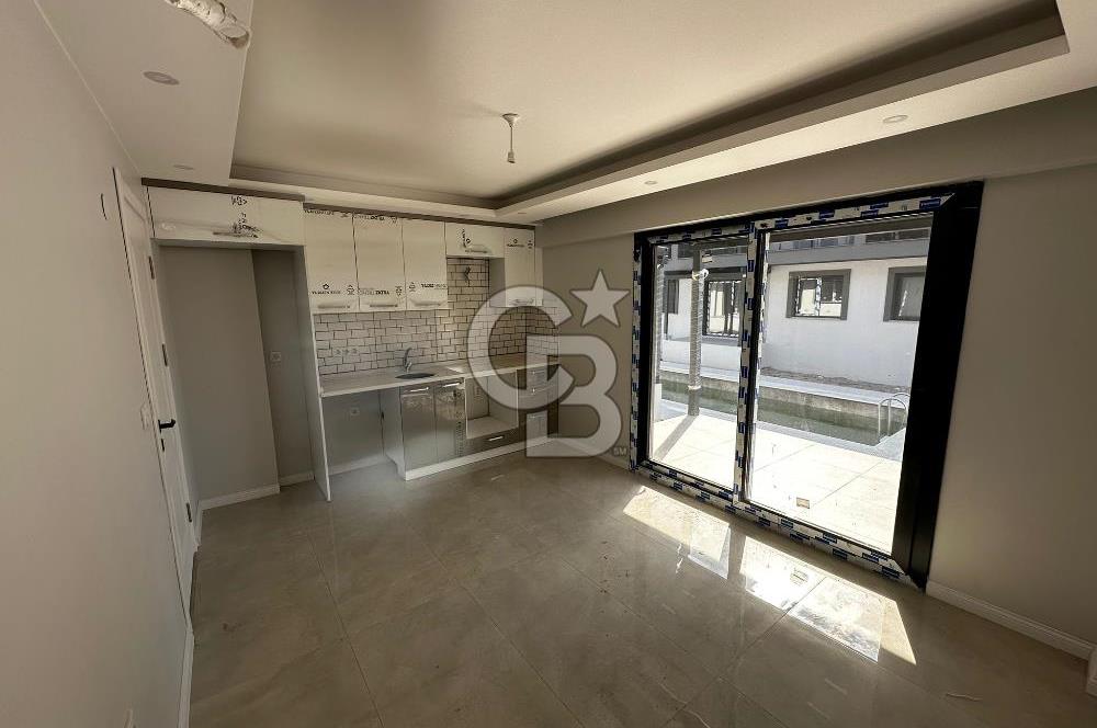 COLDWELL BANKER İYA GAYRİMENKUL’DEN  ÇANDARLI MERKEZDE SİTE İÇERİSİNDE 1+1 KİRALIK DAİRE 