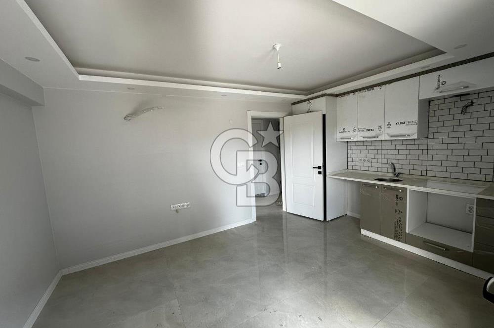 COLDWELL BANKER İYA GAYRİMENKUL’DEN  ÇANDARLI MERKEZDE SİTE İÇERİSİNDE 1+1 KİRALIK DAİRE 
