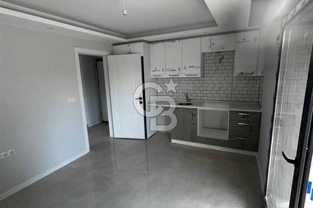 COLDWELL BANKER İYA GAYRİMENKUL’DEN  ÇANDARLI MERKEZDE SİTE İÇERİSİNDE 1+1 KİRALIK DAİRE 